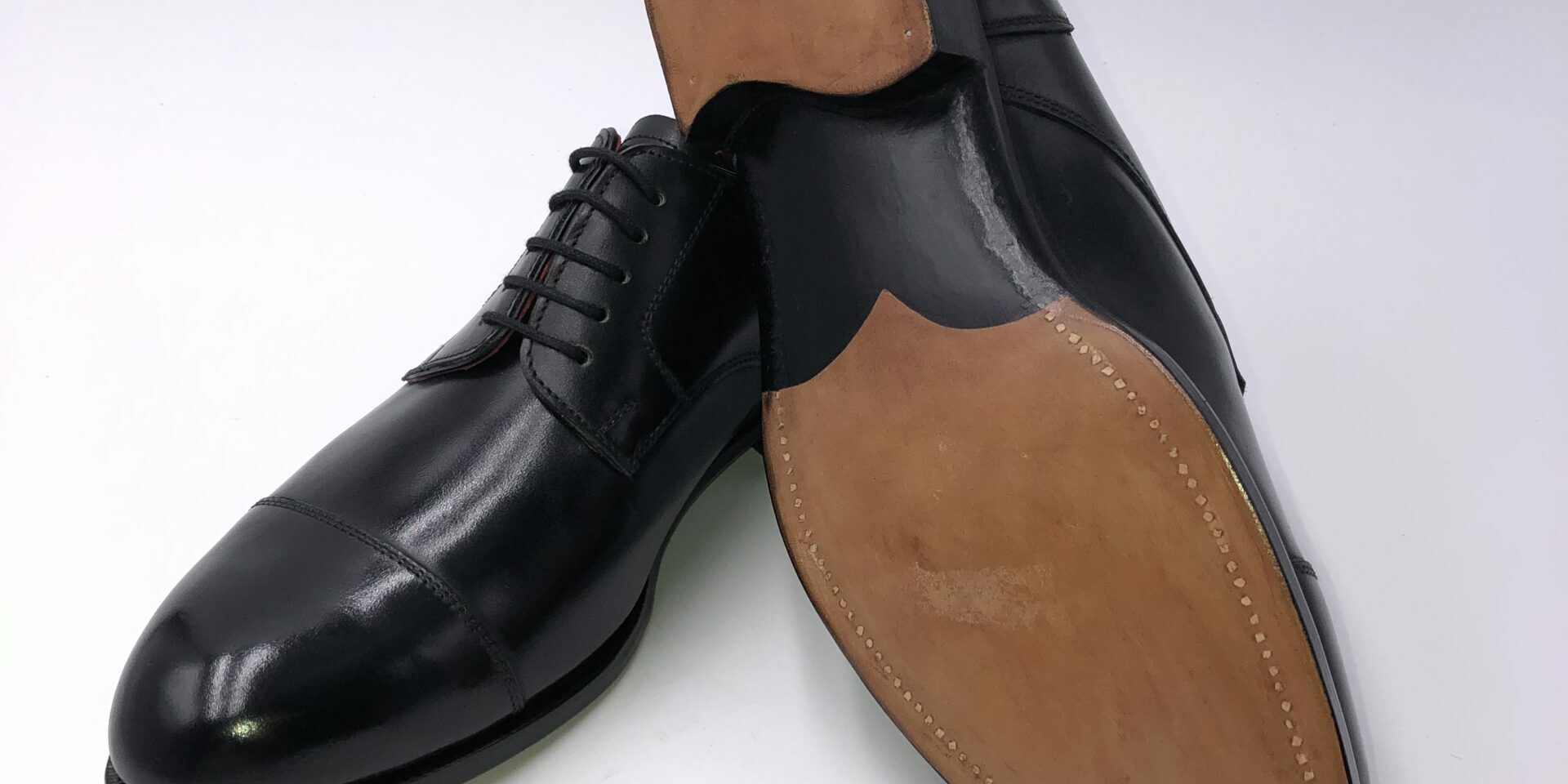 0101 Derby Kappe holzgen unten