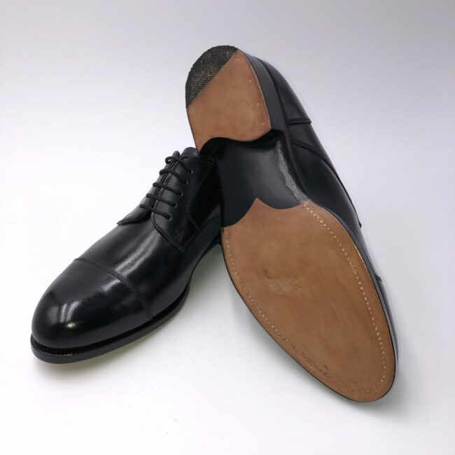 0101 Derby Kappe holzgen unten